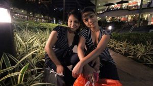 Horny Filipinas Brenda and Erika sitting together on bench outside mall
