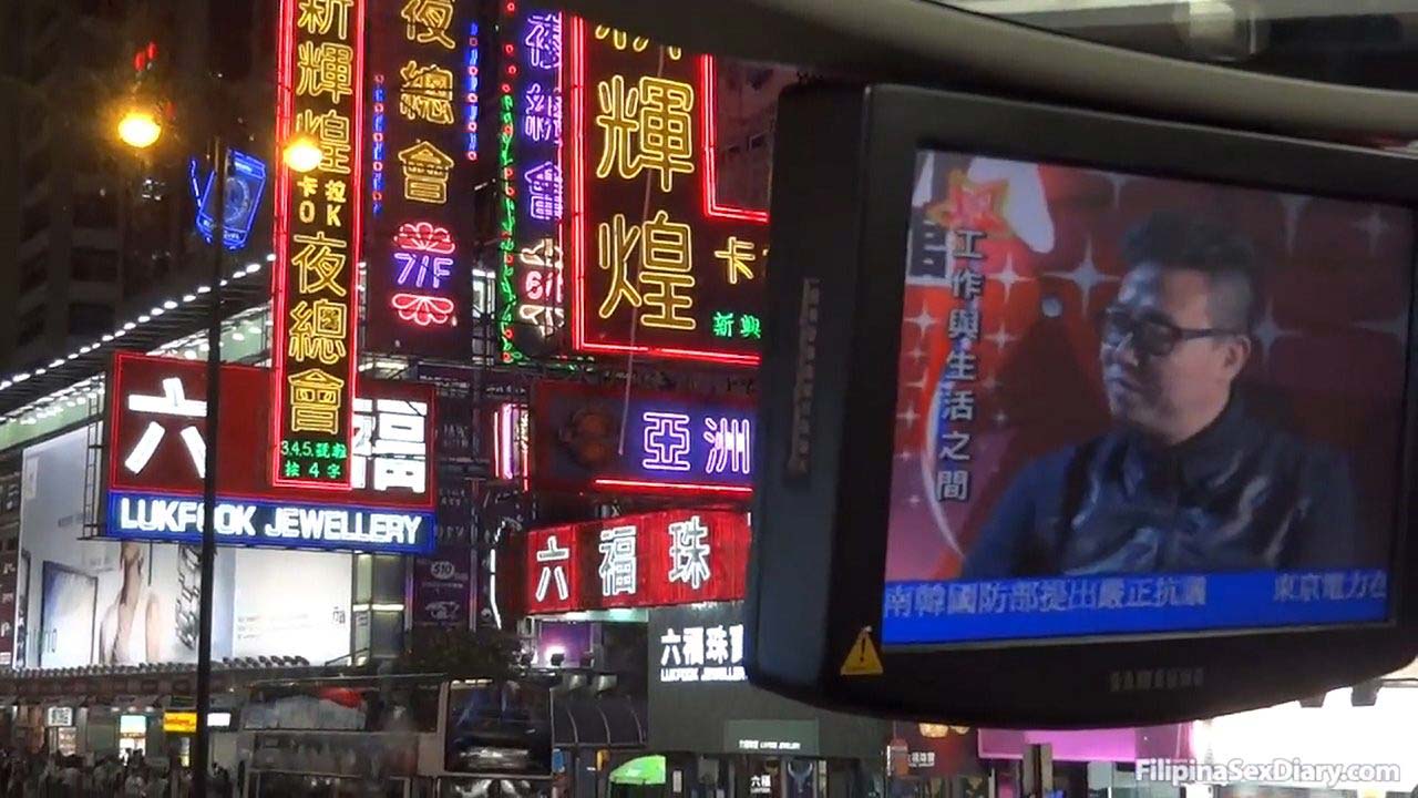 Hong Kong Wanchai district viewed from inside taxi cab