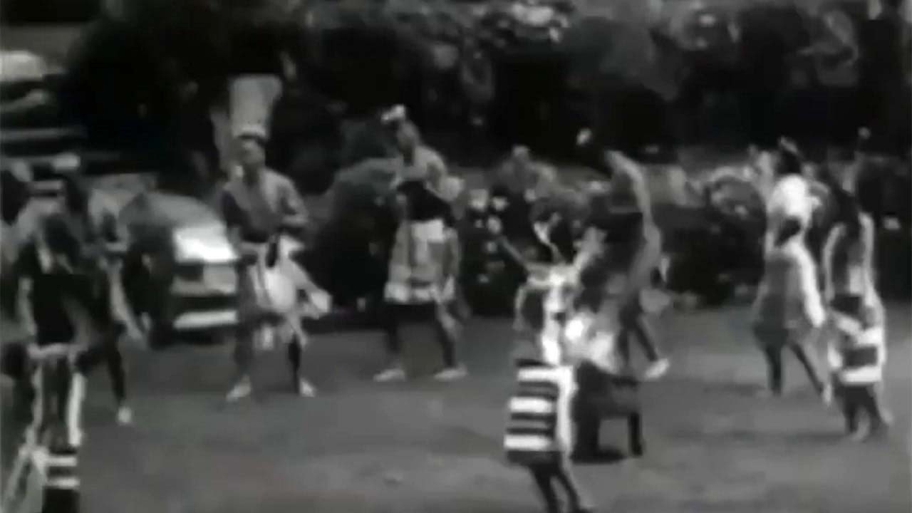 PI Archives screenshot of the film Pearl Of The Orient showing tribal members