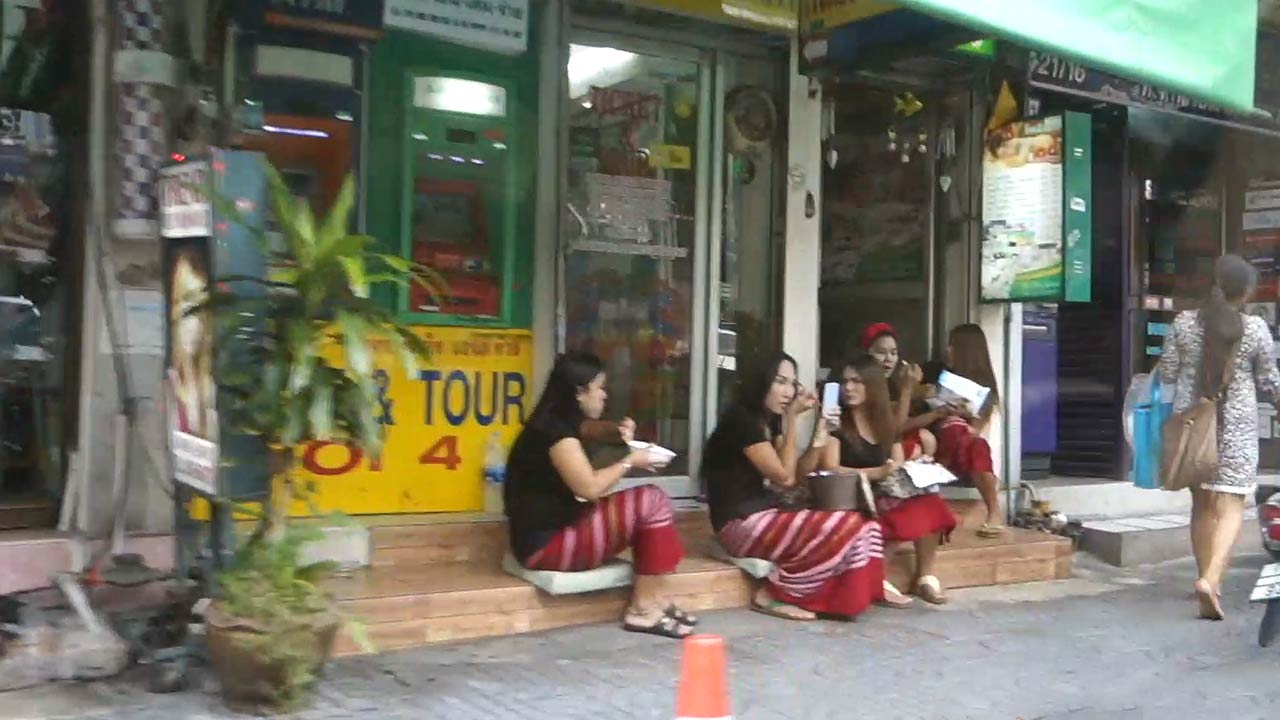 Girls all sitting on shop step on my Taxi To Bangkok