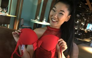 Chinese Girl opening naughty gifts on Valentines
