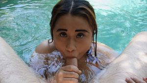 Chubby Malay MILF sucking white cock in the pool water