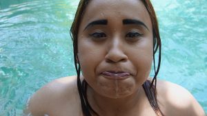 Chubby Malay MILF trying to swallow big load of cum