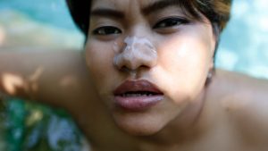 Malaysian MILF gets sticky cum Pool Facial