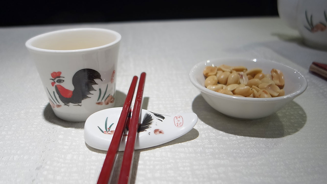 Eating Chinese Food clams and eggplant