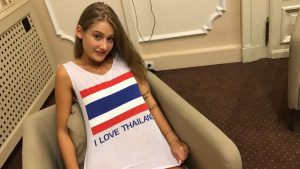 Perky Teen shows off her shirt