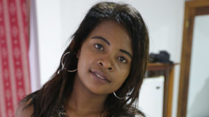 African MILF smiles because she's about to get fucked