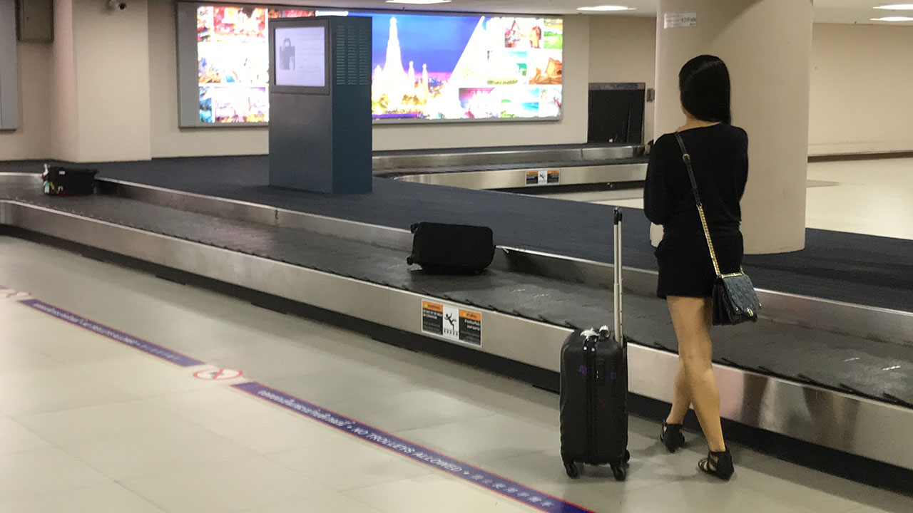 View of sexy flight attendant legs while Leaving Koh Samui en route to my Bangkok Layover