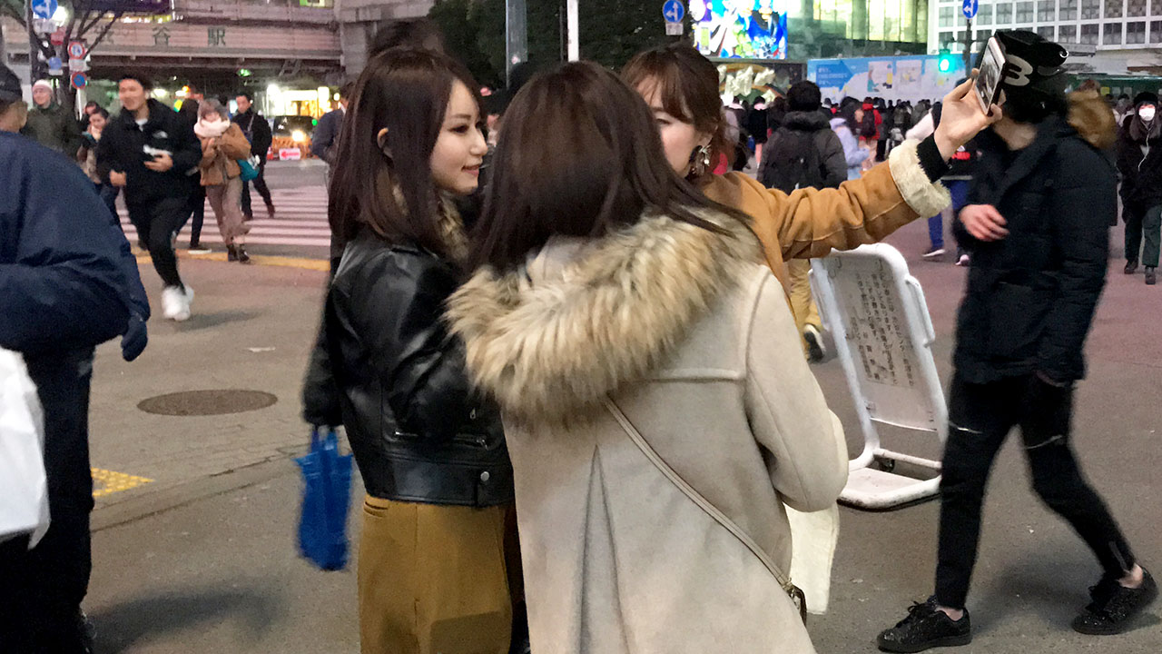 Hot Tokyo Girls taking a selfie on my walk around the streets