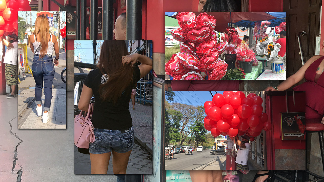 View of girls along Fields Avenue Angeles City where all the Valentines preparations are beginning for tomorrow