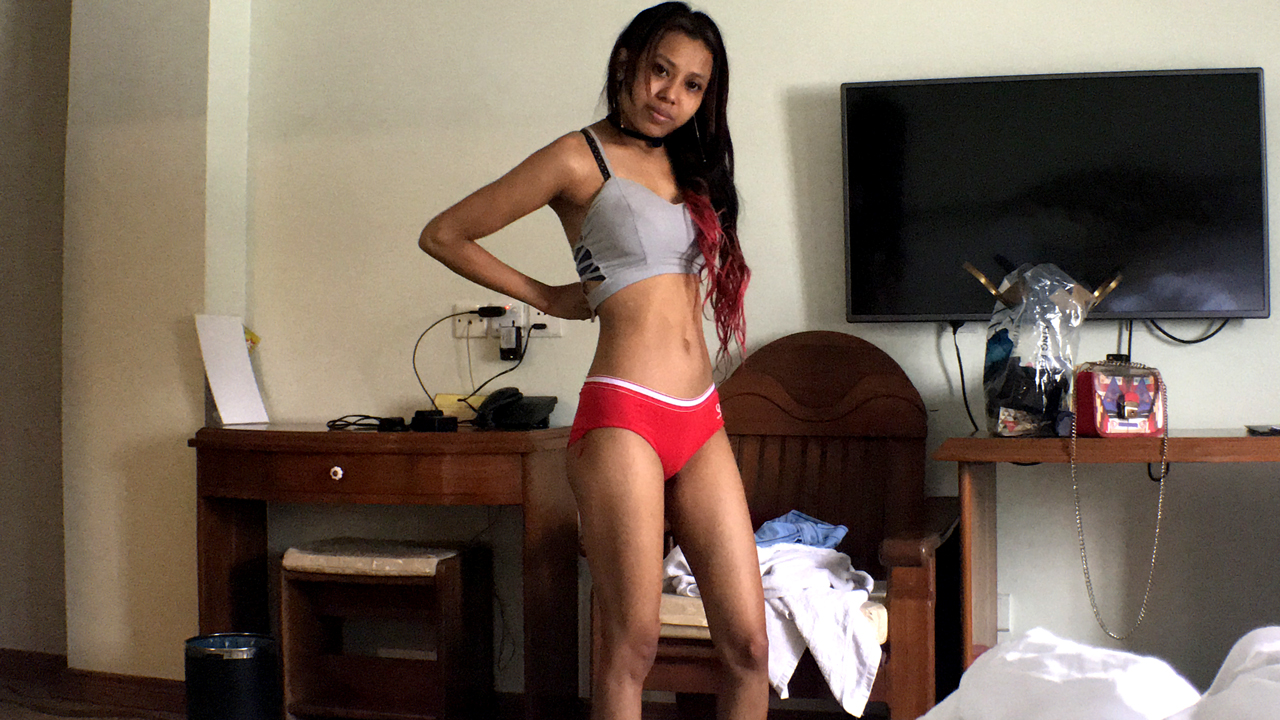 Yom Asian Getting Dressed from nude on camera