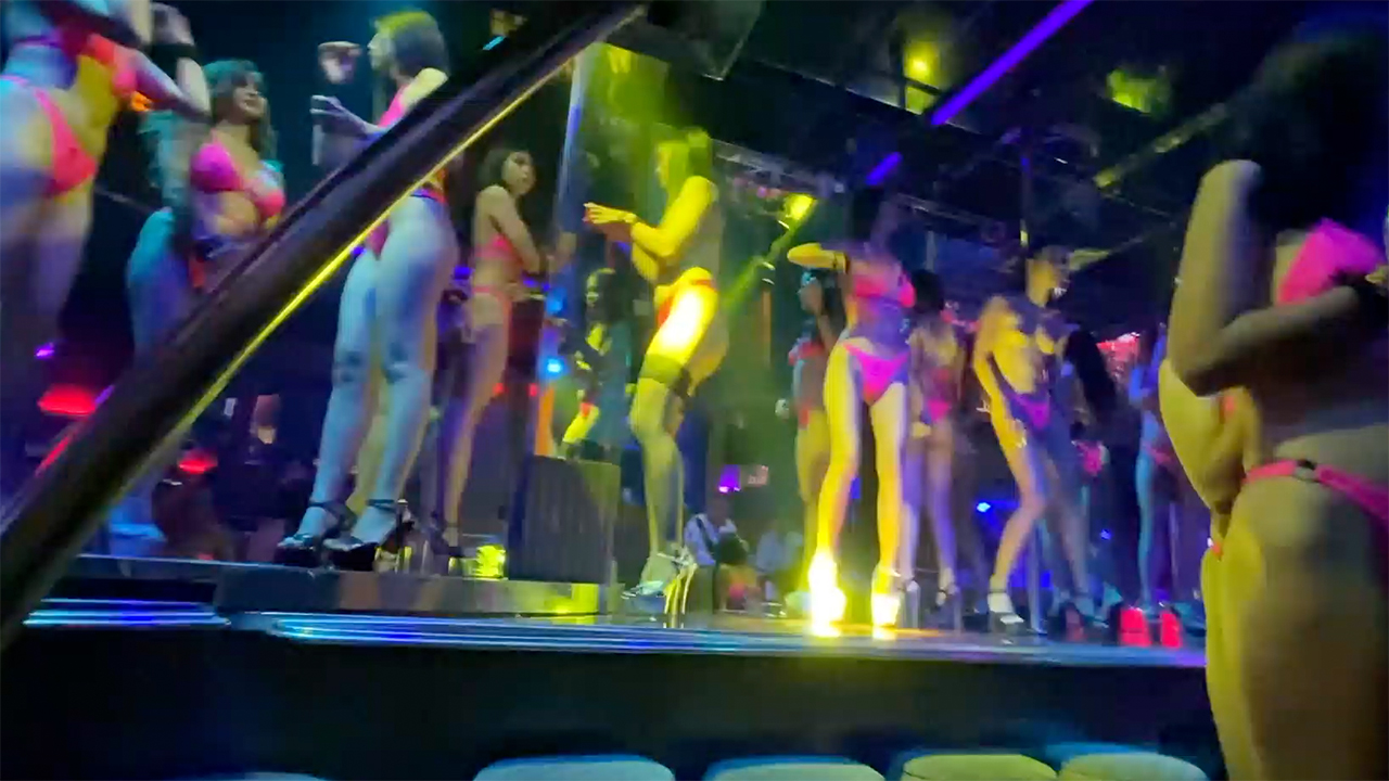 Queen A GoGo girls dancing on stage