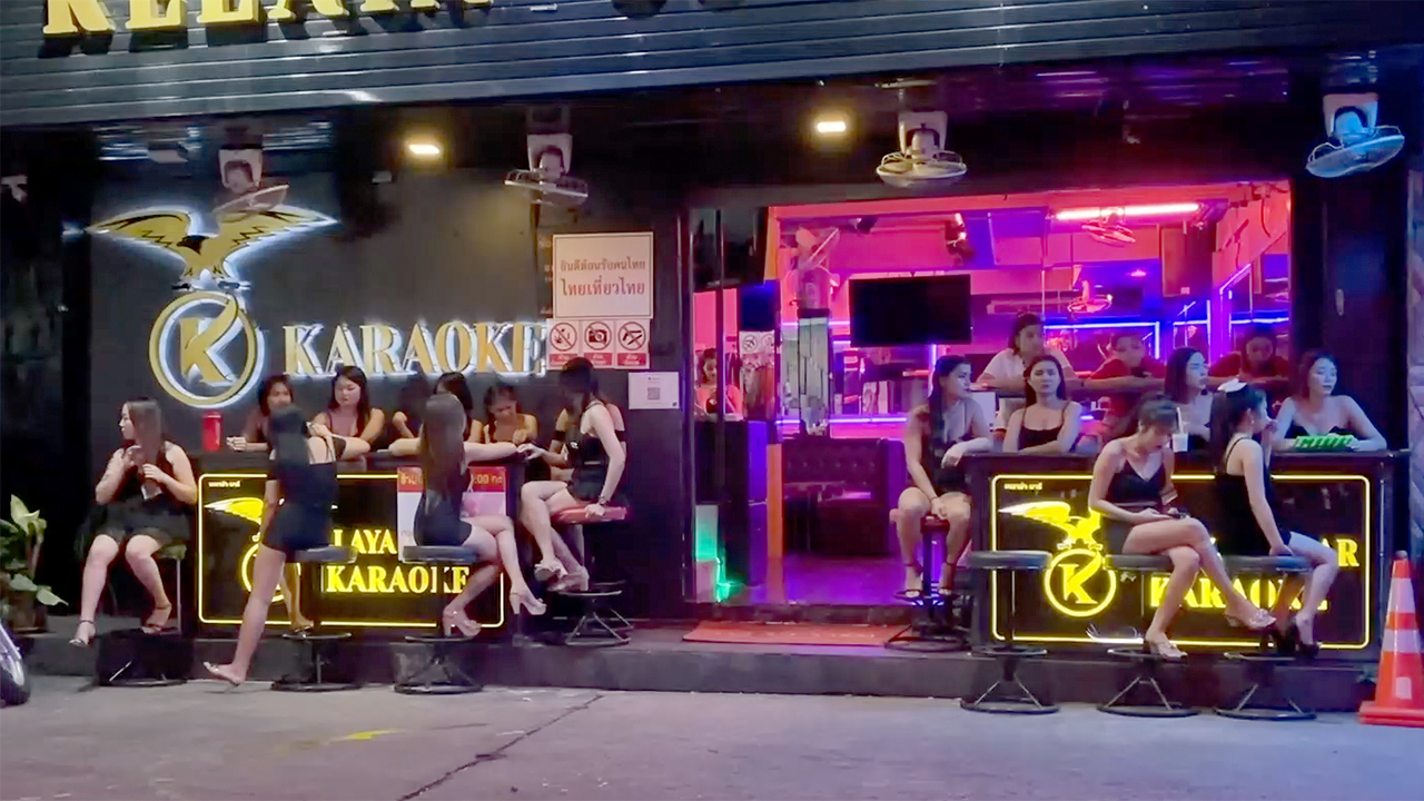 Girls sitting down outside club when barhopping in Pattaya