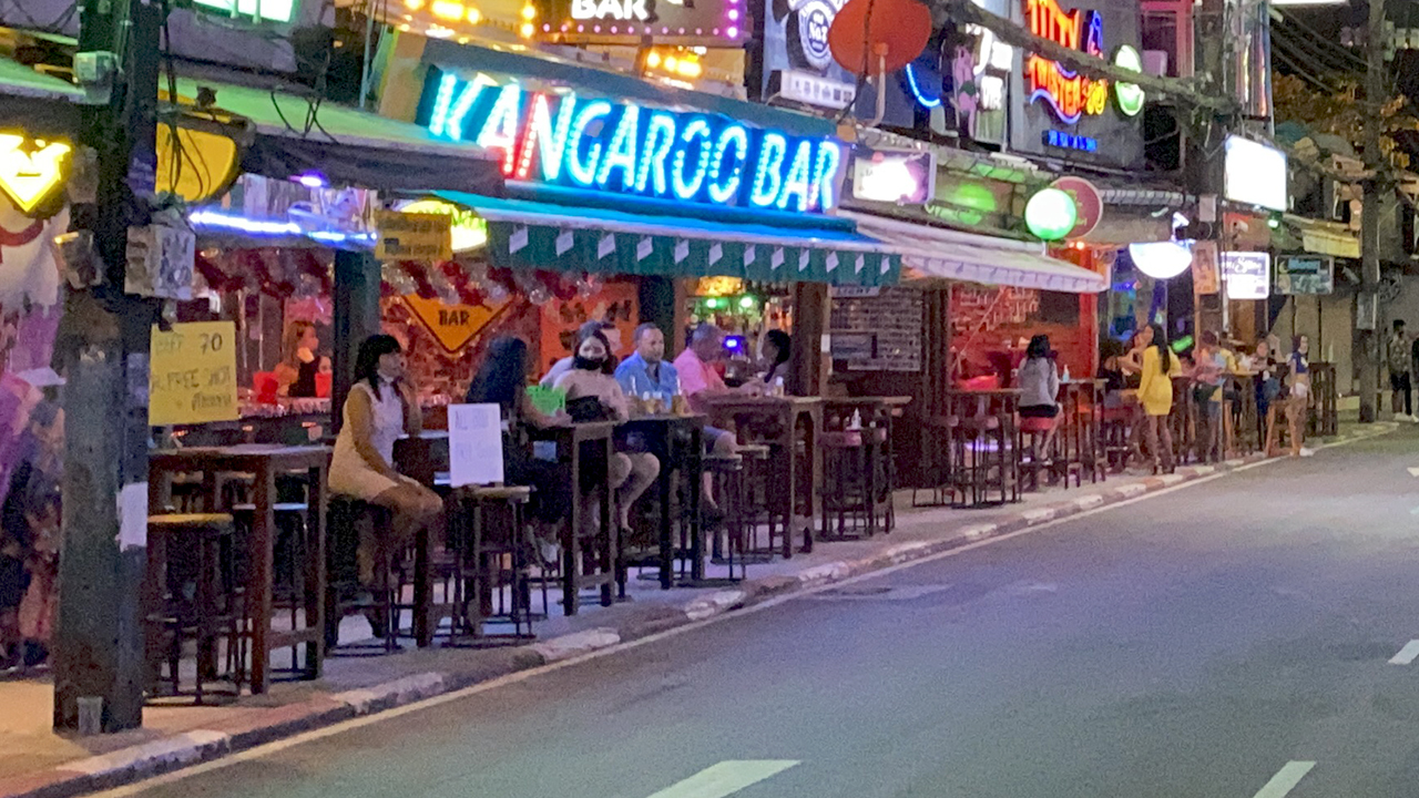 Thai Girls lined up at side of Kangaroc Bar on Bangla Road walking street