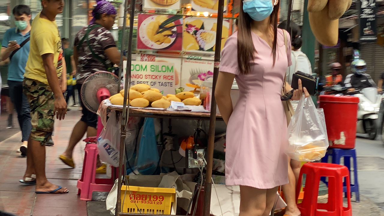 Cute Girl On Walk in Bangkok market