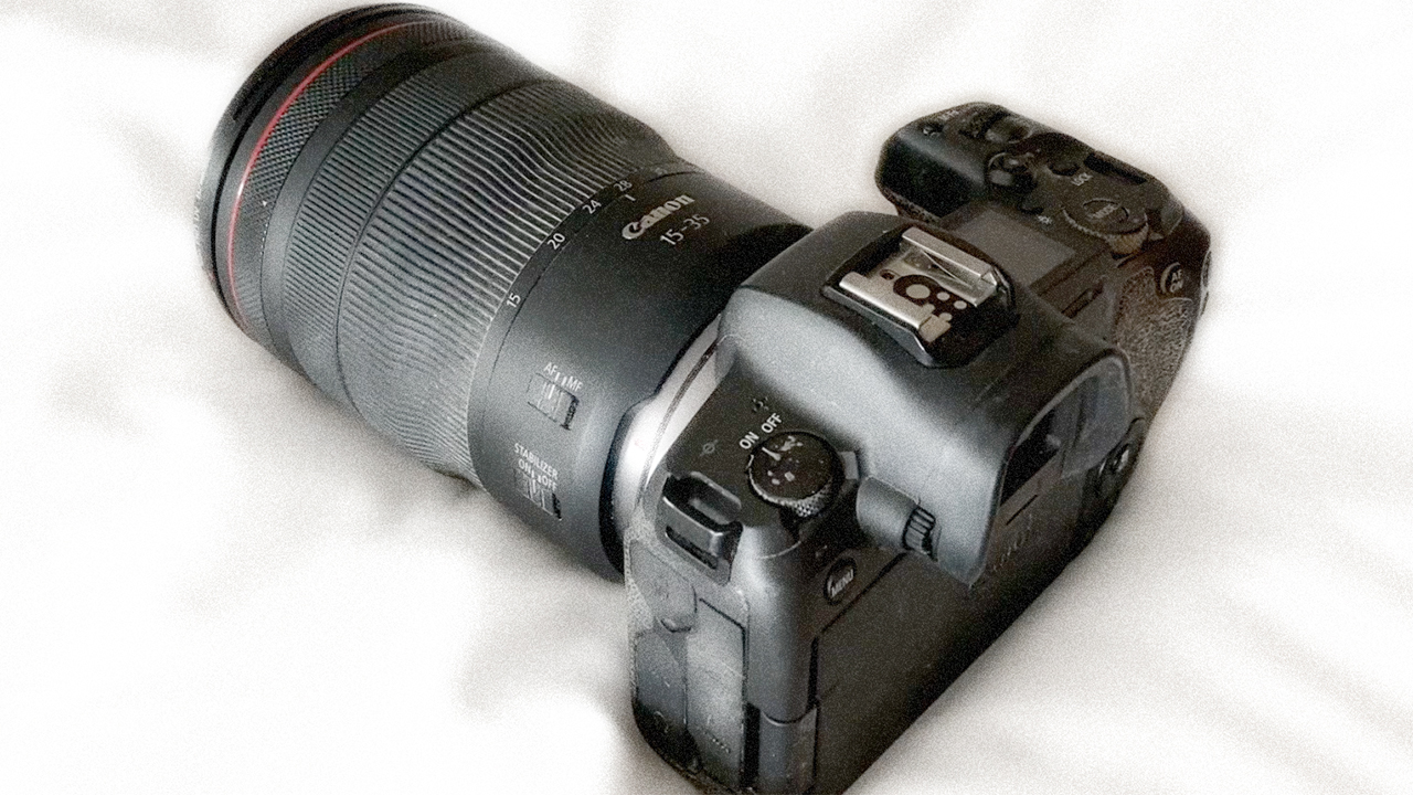 Well used Canon single lens Reflex Camera with 15-35 lens