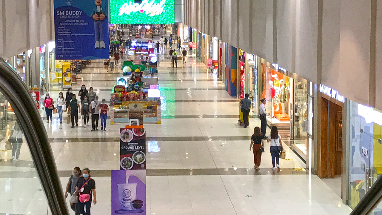 View inside SM Mall Angeles City Philippines from top of escalator
