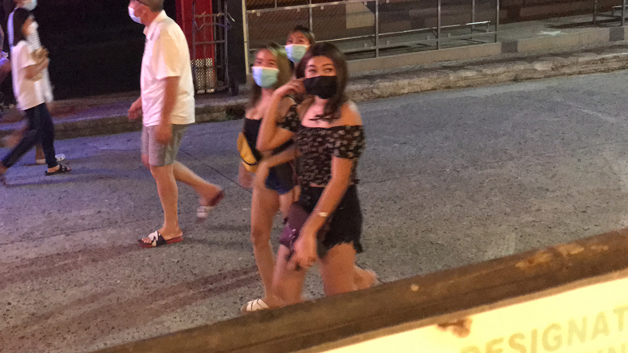 Flirty Asian Girls in masks on Fields Ave