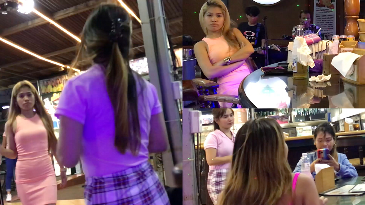 Blonde sexy girl playing pool in Angeles City Philippines sports bar