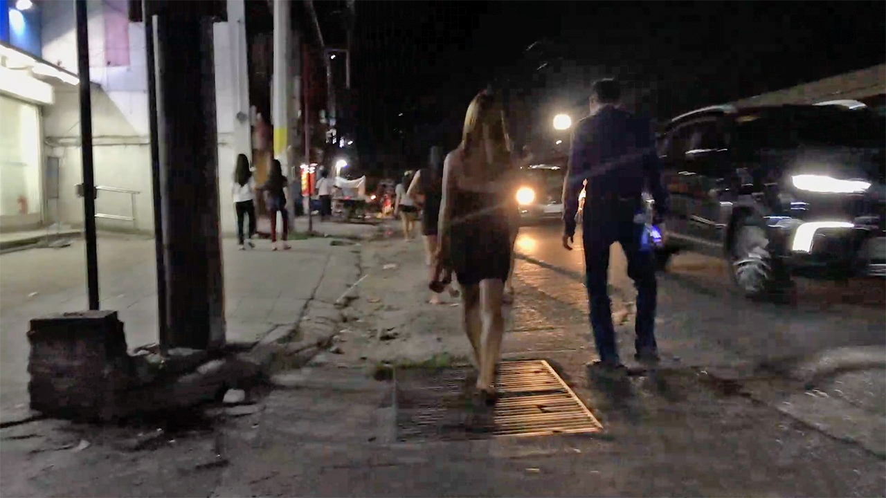 Hot Girl In Skirt walking with man at night in Angeles City