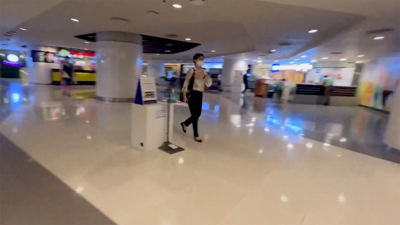 Short Haired MILF in Bangkok walking through mall