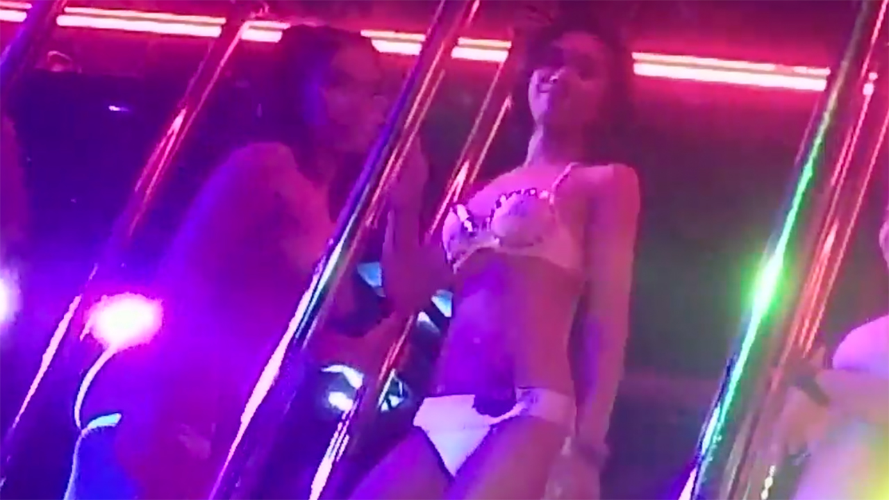 Thai girls dancing on stage at Soi Cowboy