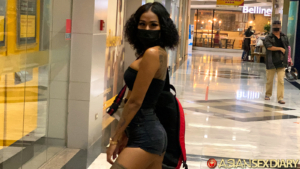 Posing sexy in mall with mask on