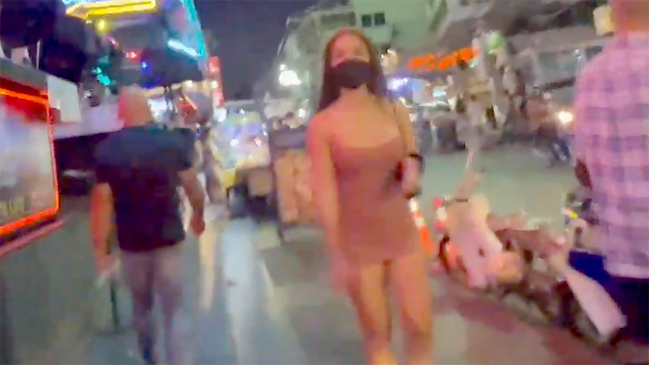 Soi Nana Girls walking on sidewalk in masks