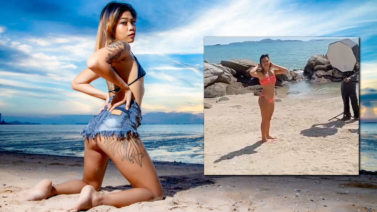 Asian Beach Babe Pookie poses in butt cheek shorts