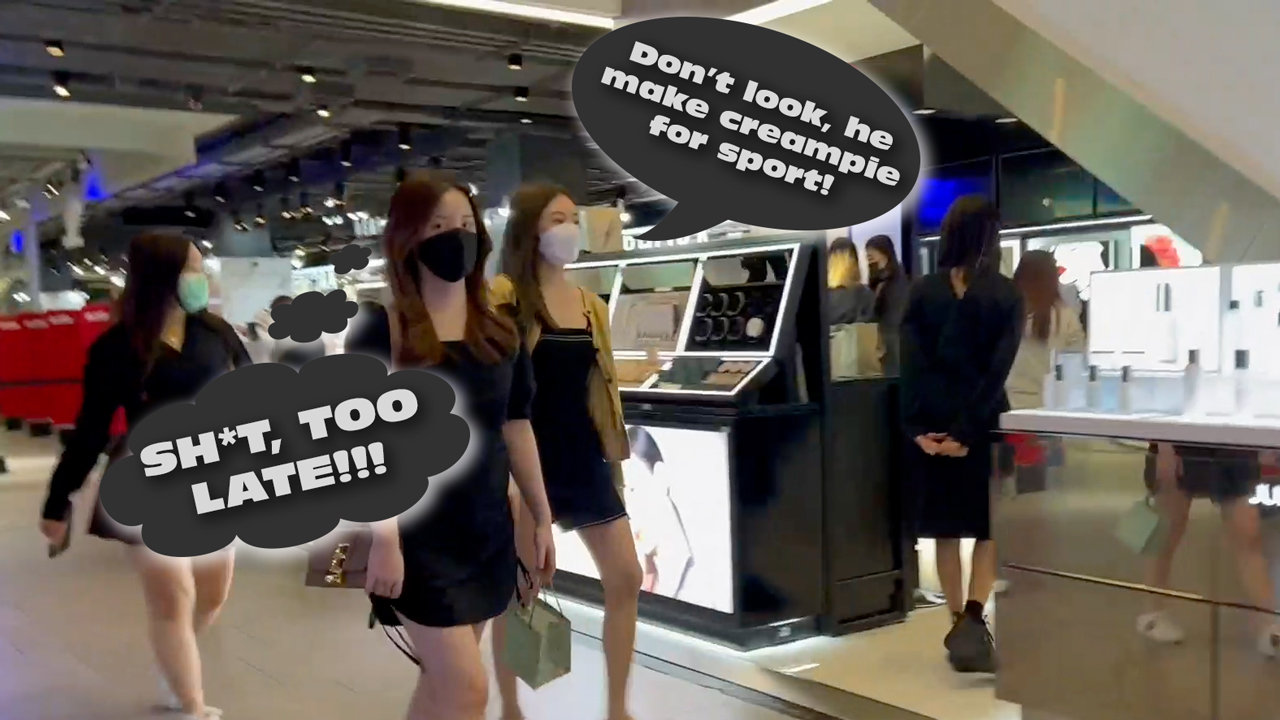 Hot girls walking through Siam Center Mall Bangkok shop aisles