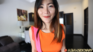 Happy MILF smiles close to camera