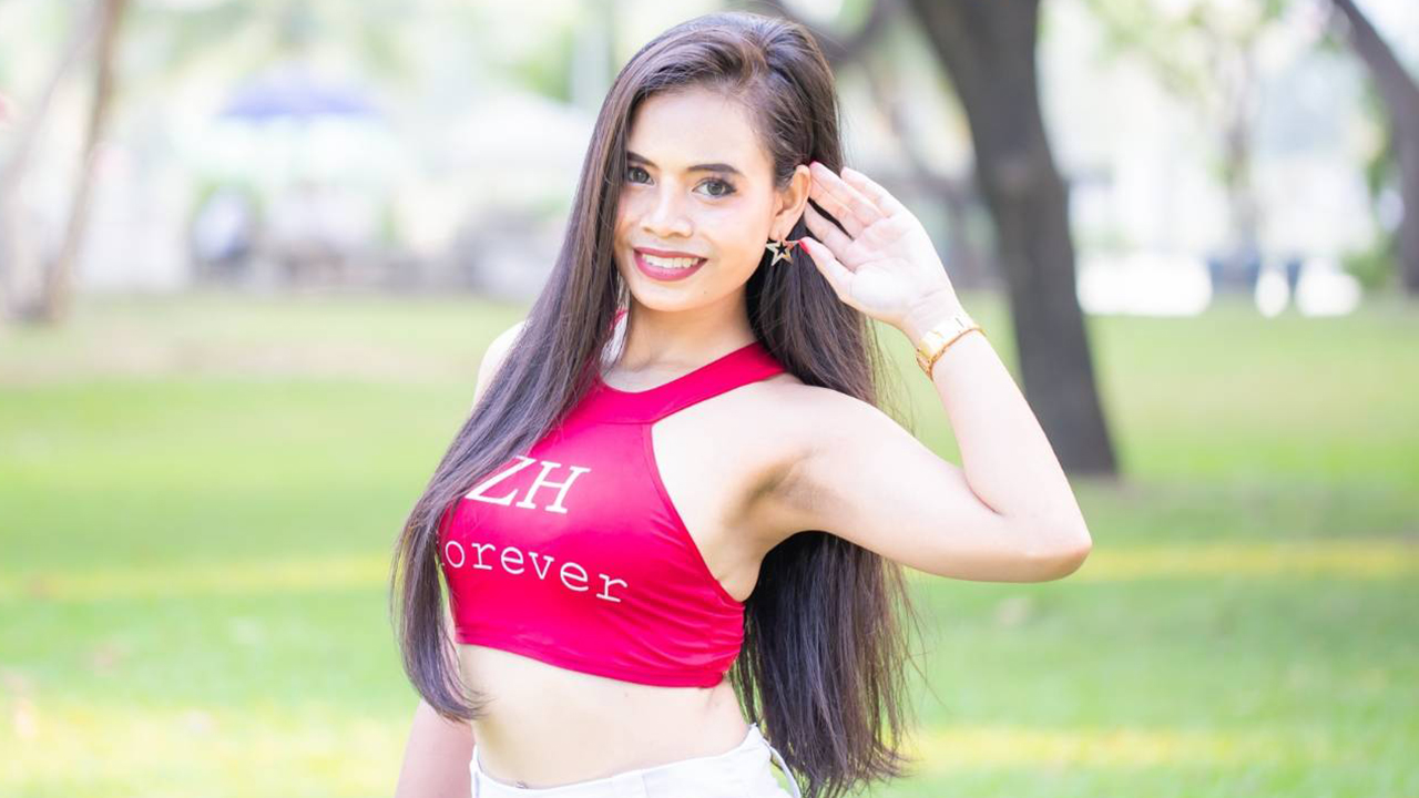 Sexy Asian Model Barbie C poses with long hair in park