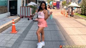 Showing off sexy legs outdoors in Bangkok