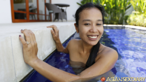 Smiling big after fucking in pool