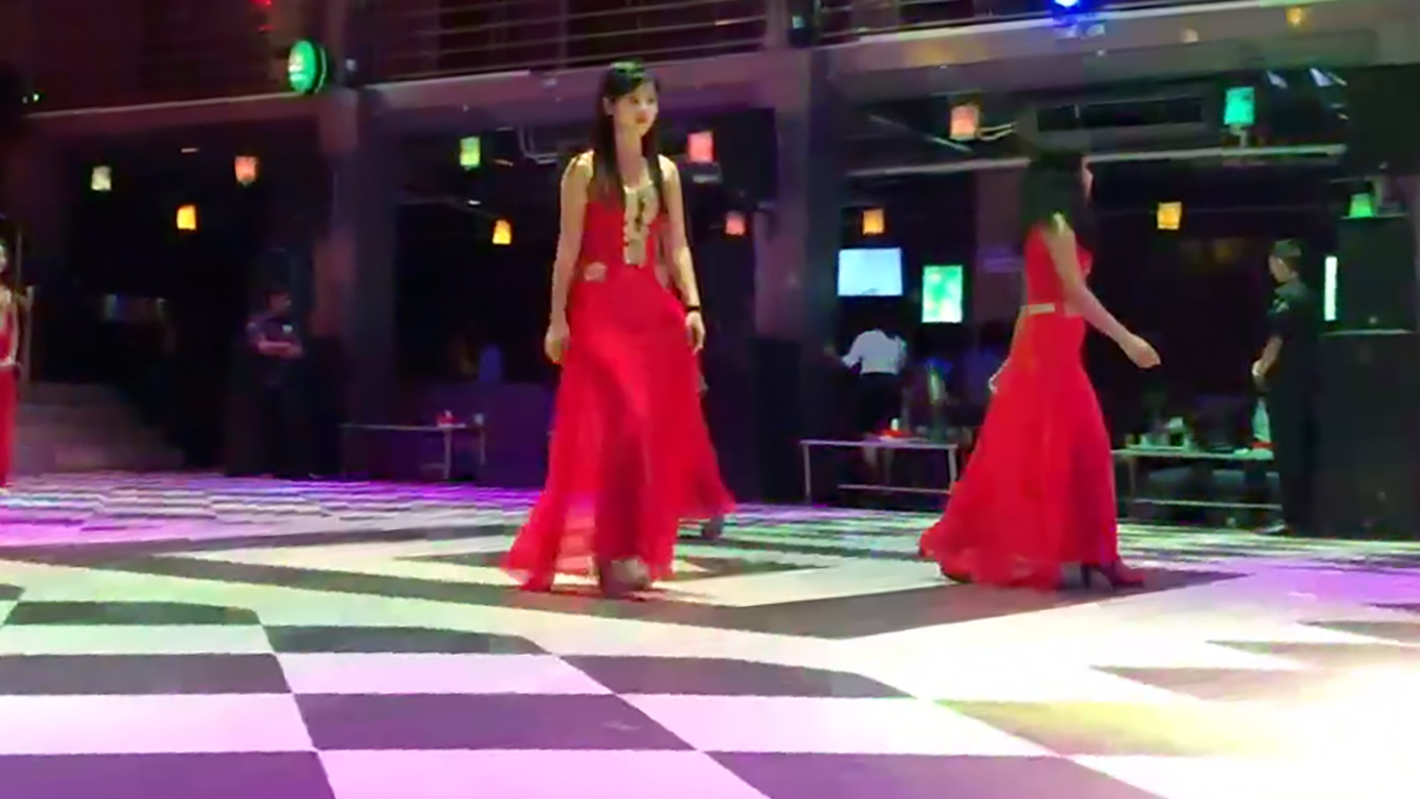Girls in dresses walks in club when Going Out in Yangon At Night