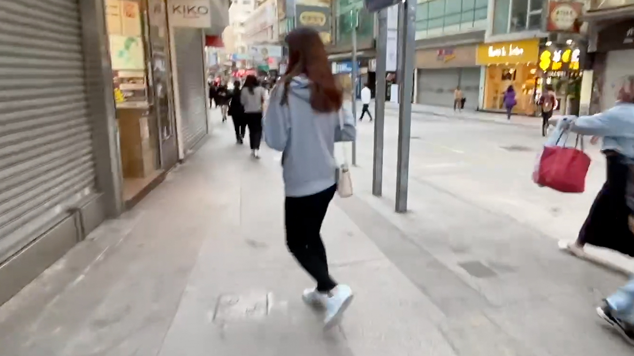 Pretty girl Walking In Hong Kong when I went to get breakfast