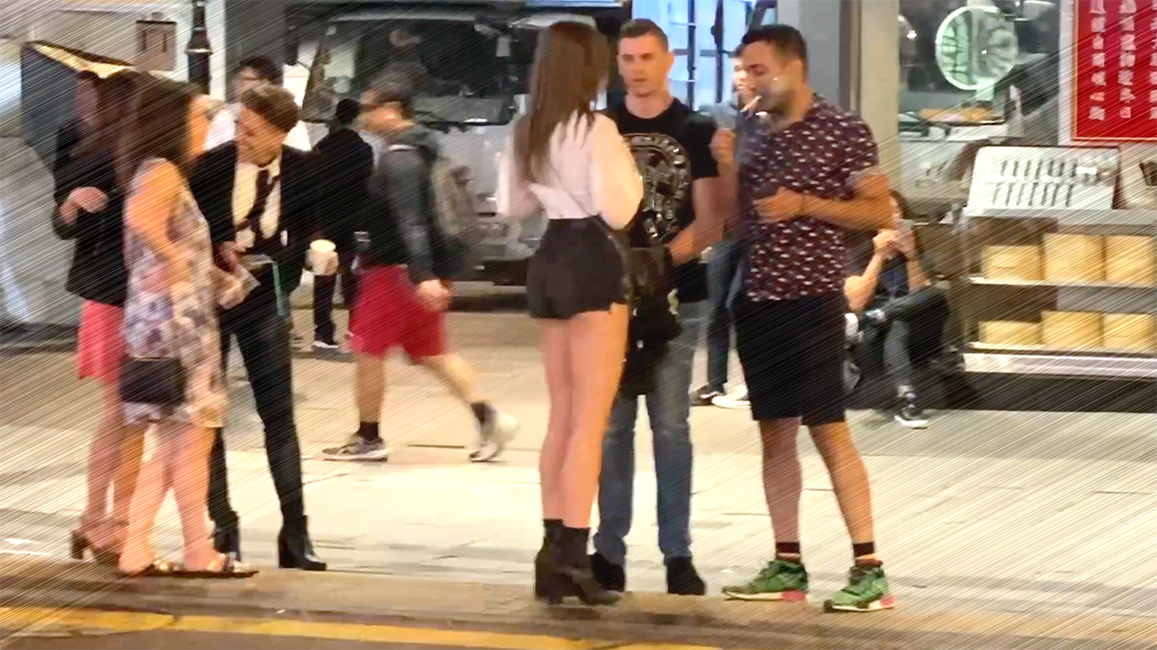 Girl with Hot Asian Mini Skirt talking to men on side of the road