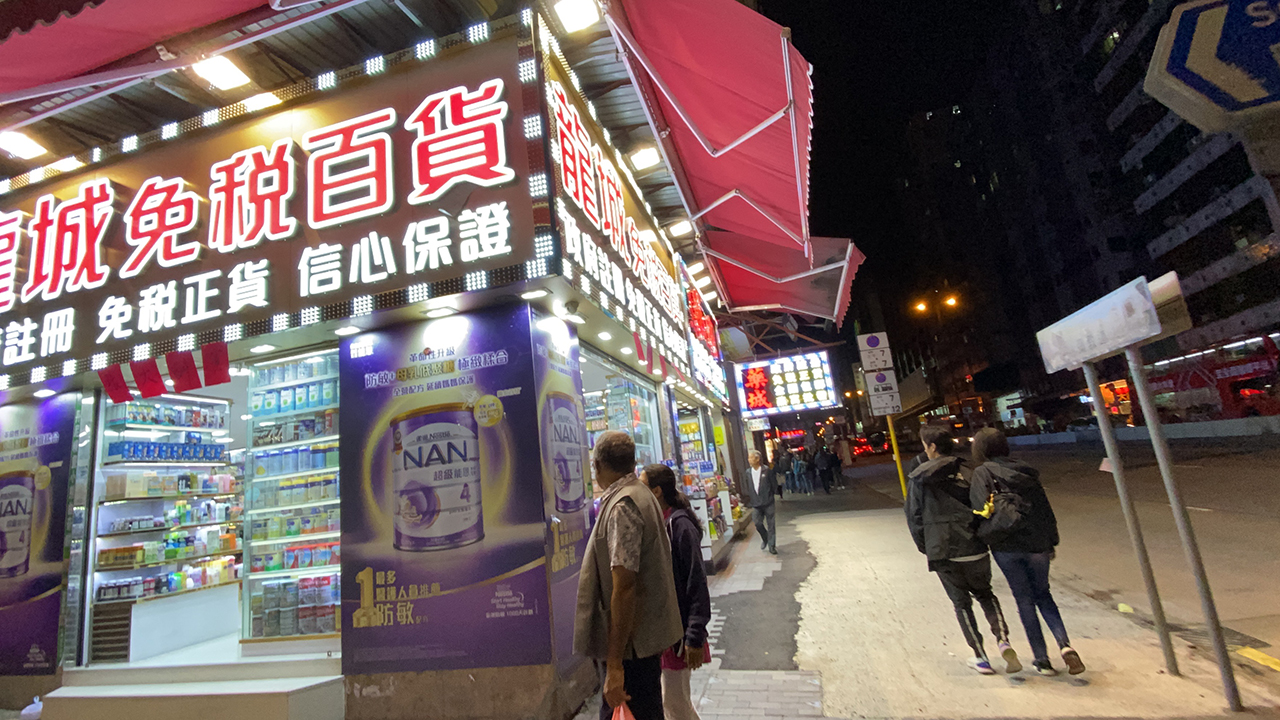Hong Kong Night Time view of neon signs on storefronts