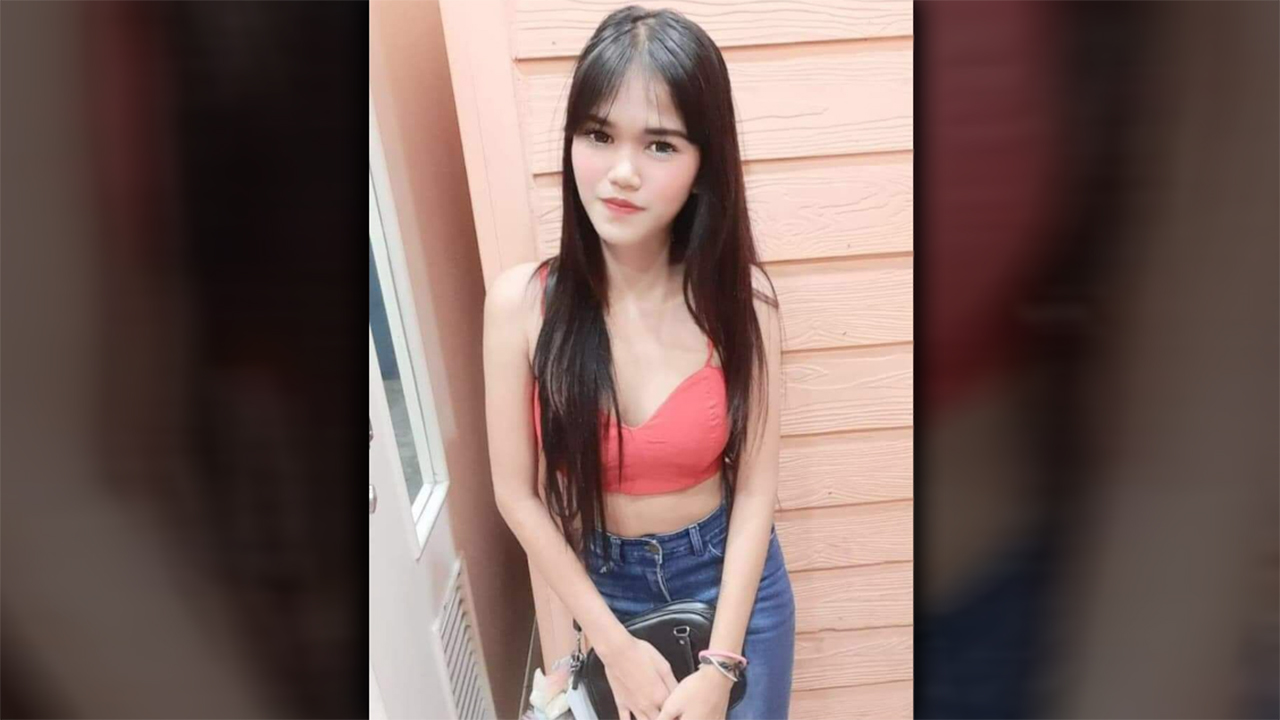 Long Hair Thai girl in tight jeans and revealing top