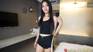 Sexy maid in short denim black shorts