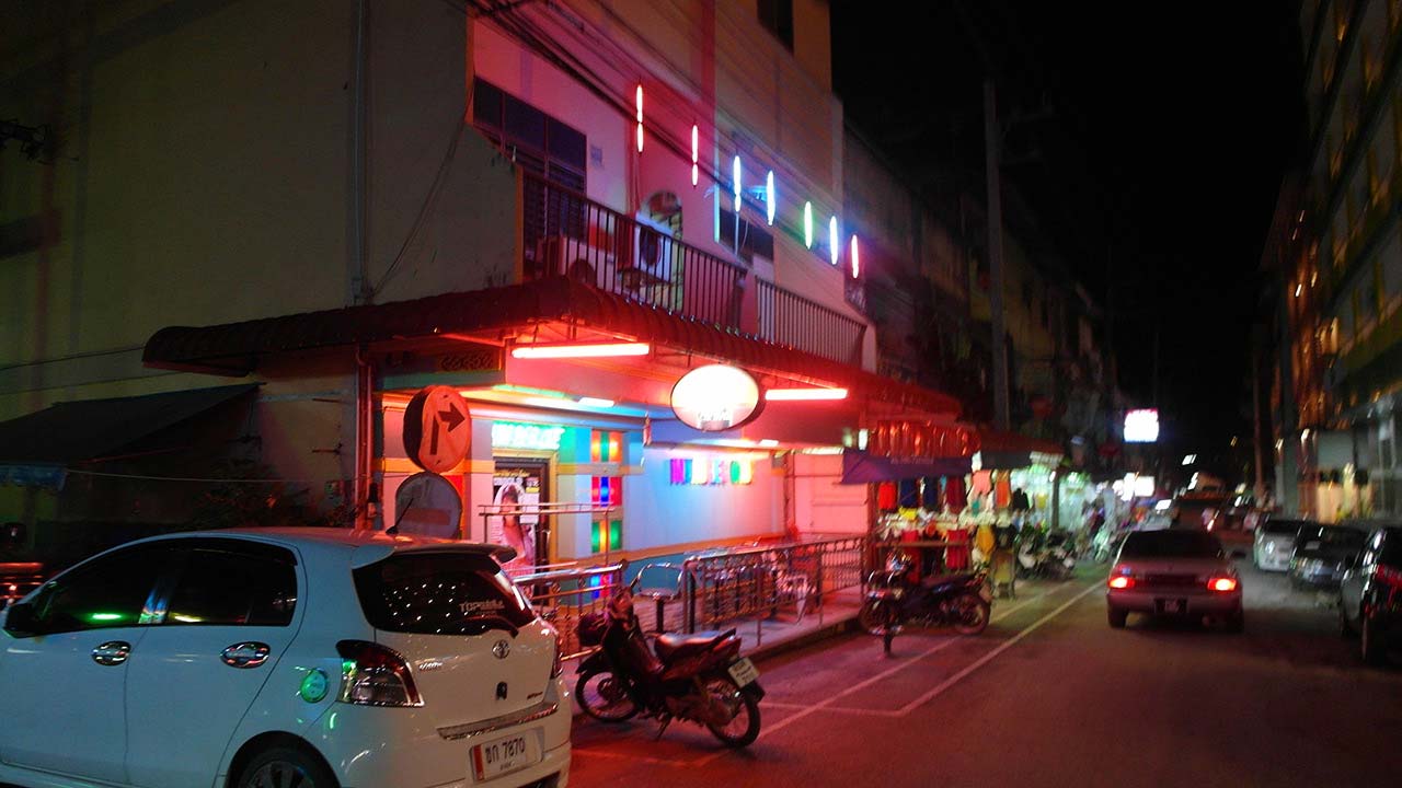 Club lights viewed from street in Danok Thailand