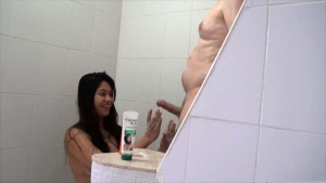 Sheree stares in amazement at hard white cock while giving Blowjobs In Shower