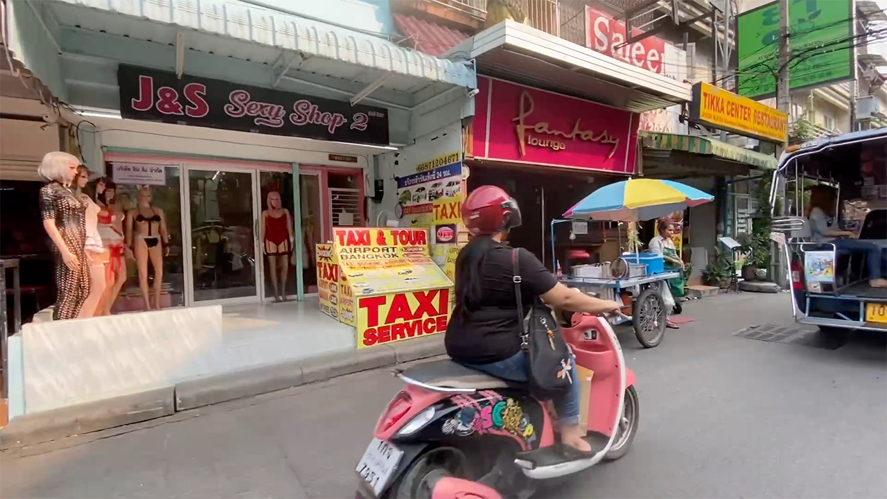 Chubby Scooter Girl on the street in Pattaya Thailand
