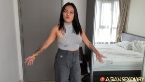 Chunky Asian MILF in shirt with no bra on