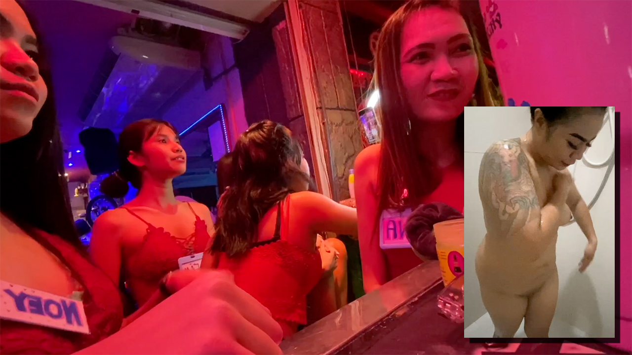 Showering Thai Girl and view of girls at table in Soi6