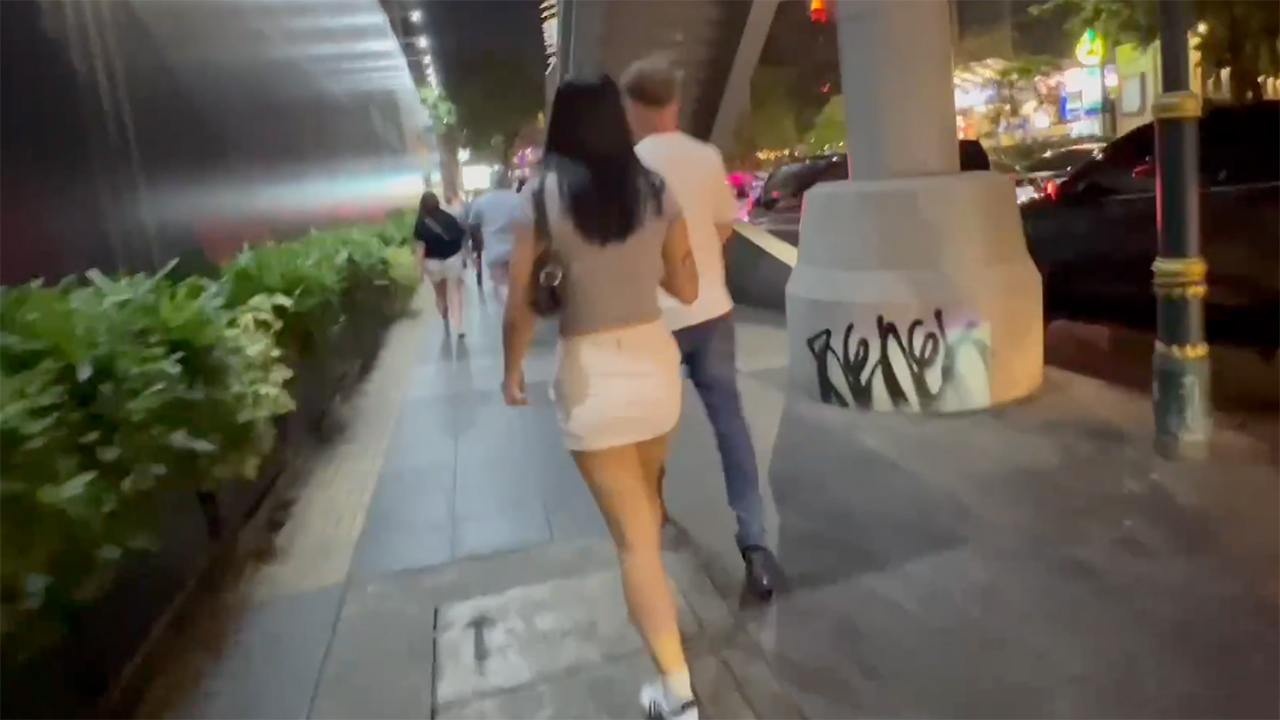 Thai Girl walking in Short White Skirt