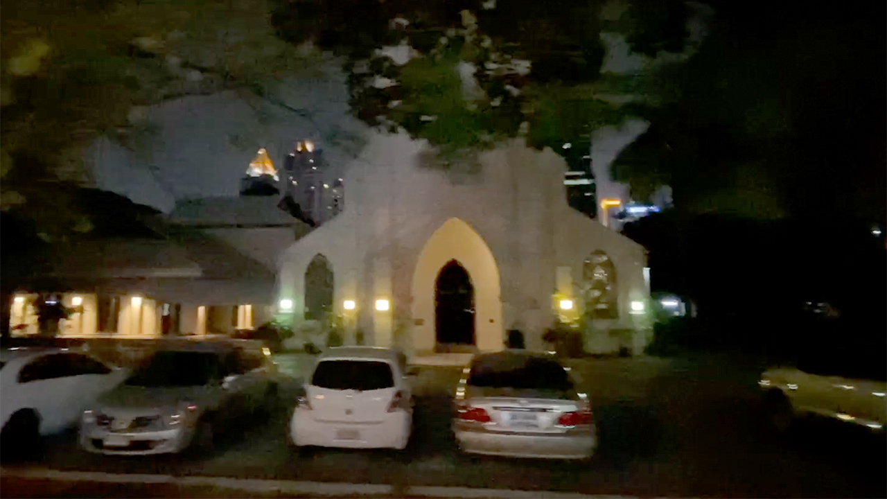 View of Christ Church Bangkok facade and parking lot