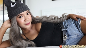 Beautiful Thai in fun rabbit ears hat