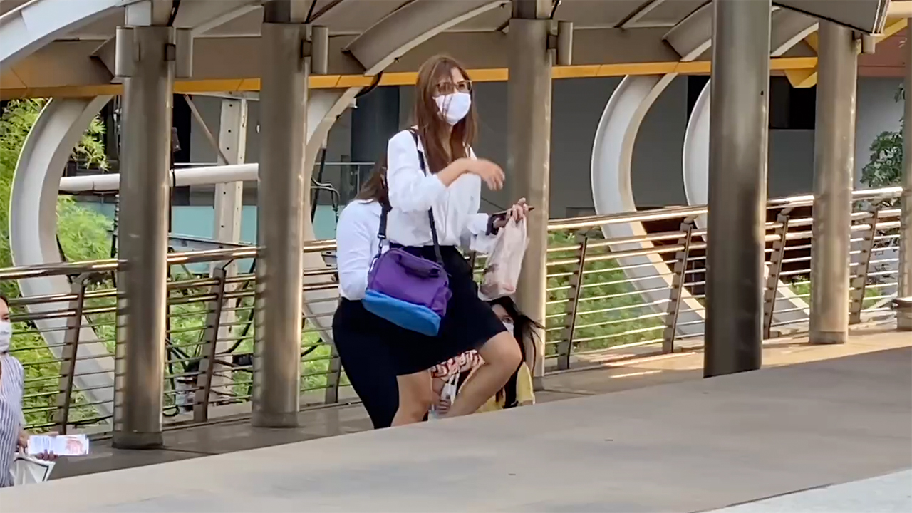 Schoolgirls In Short Skirts walk up small stairs