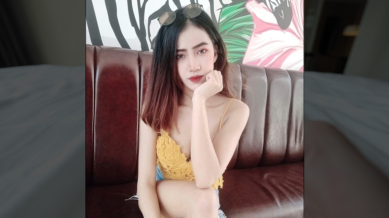 Benny Skinny Thai Babe poses for social media photo